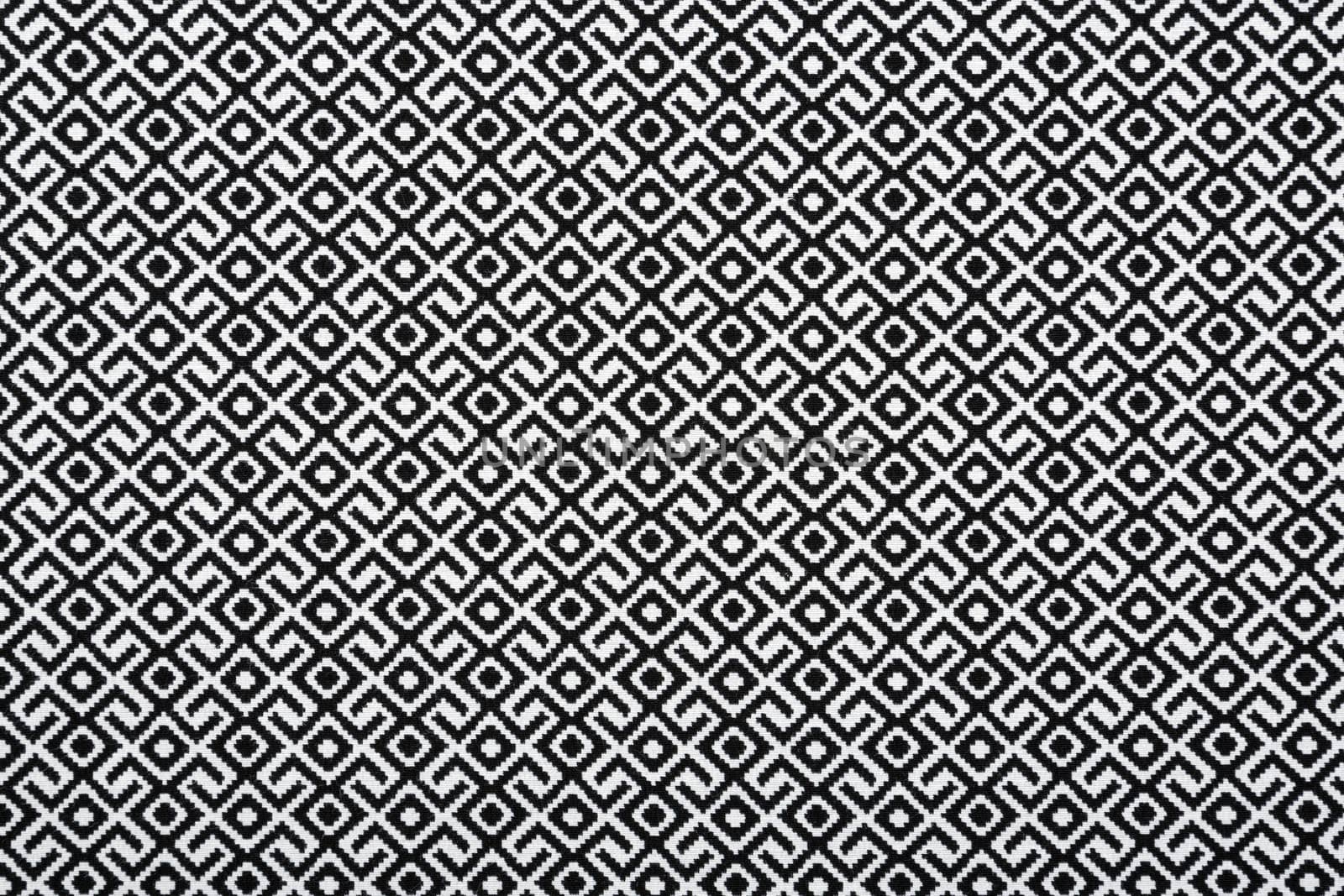 Material in geometric patterns, a textile background.