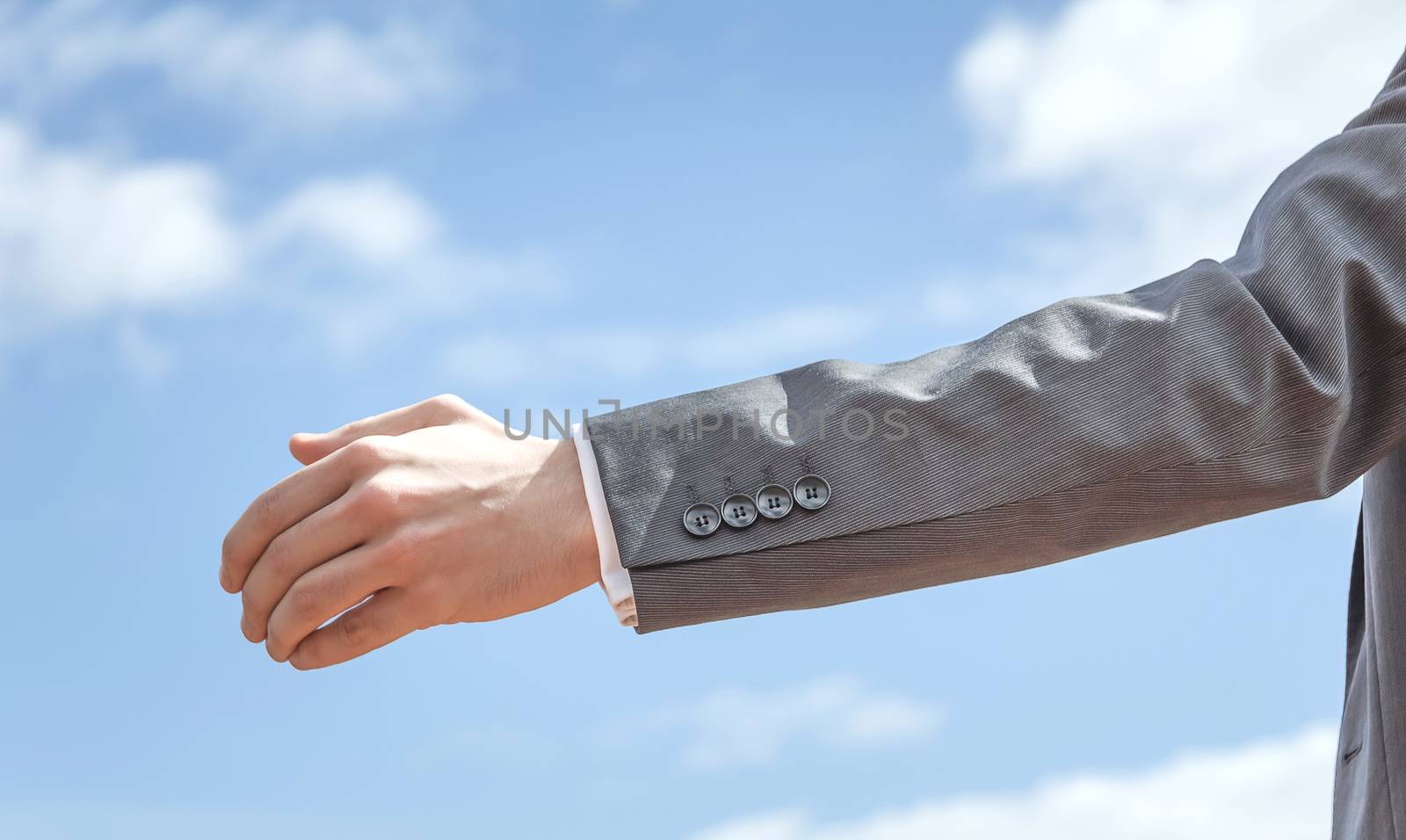 Closeup of business man showing his open hand by doble.d