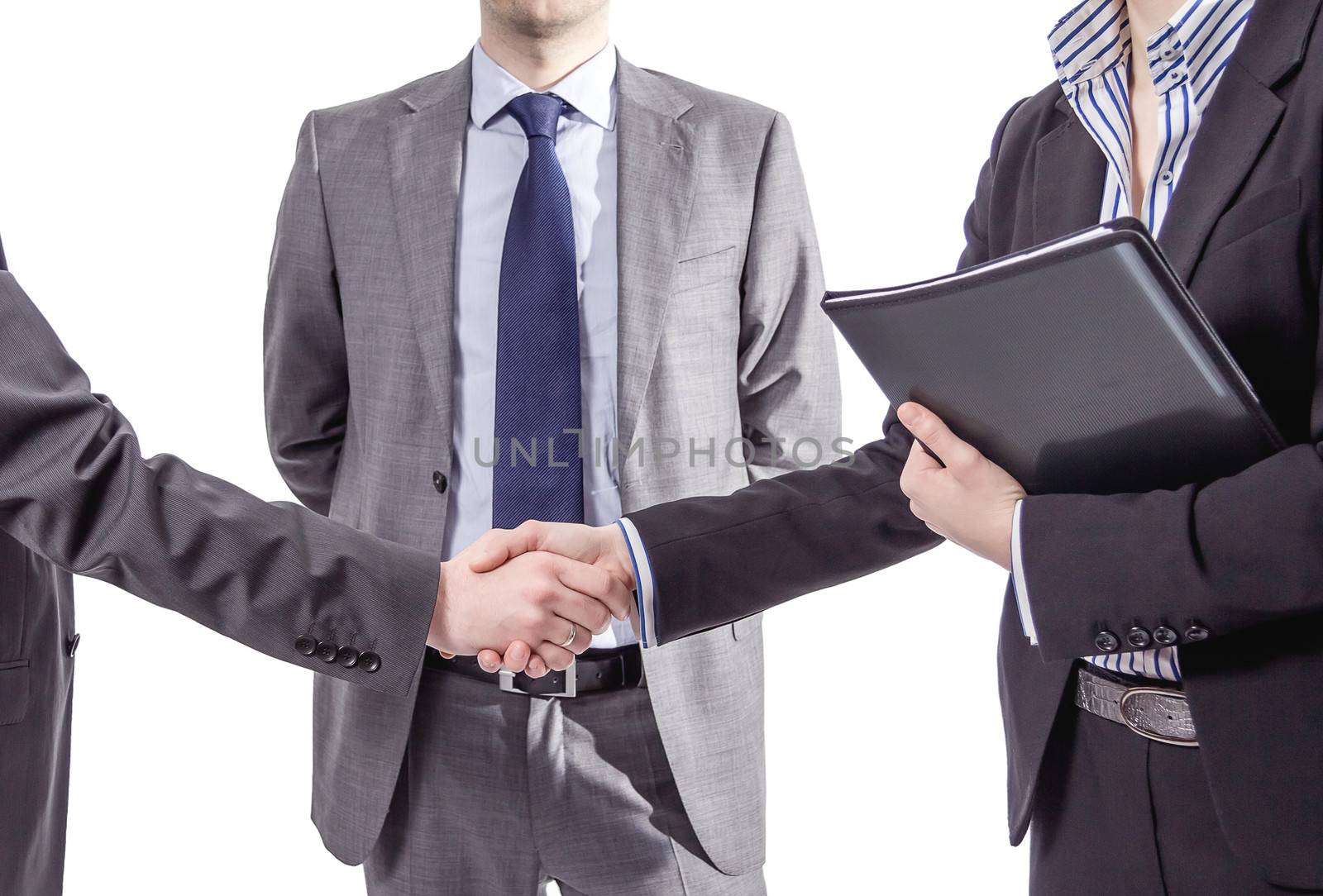 Business handshake for a closing deal by doble.d