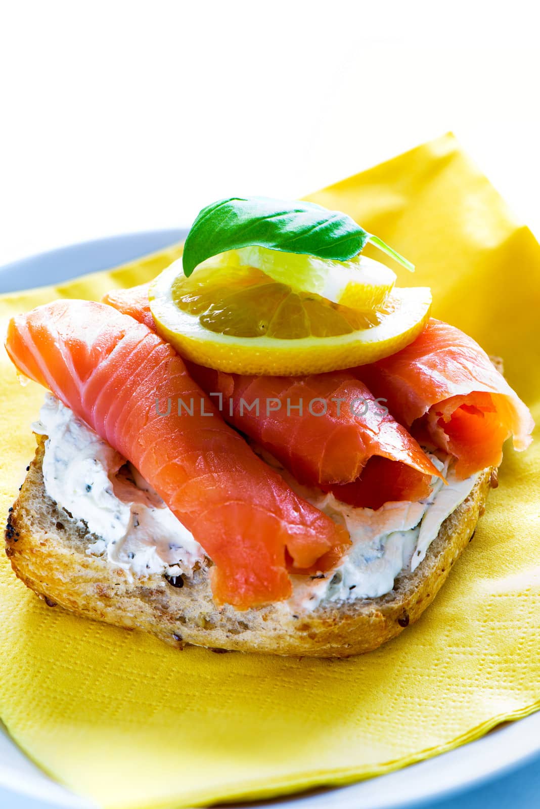 Sandwich with smoked salmon and soft cheese