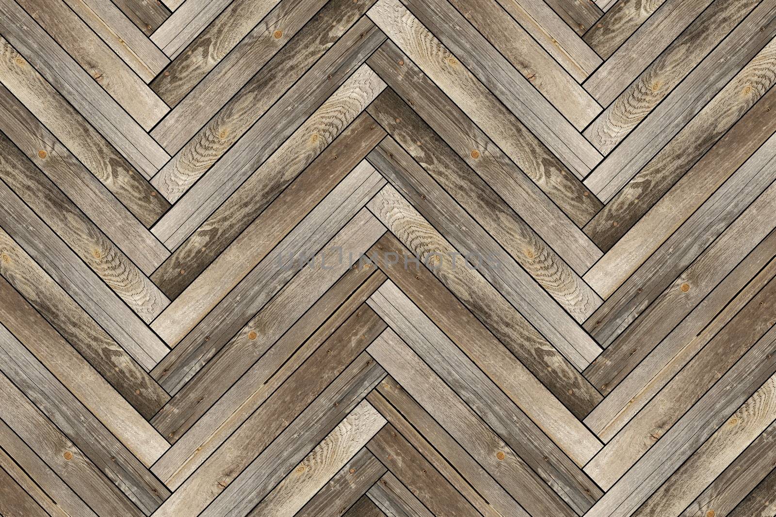 pattern of old wood tiles forming parquet floor