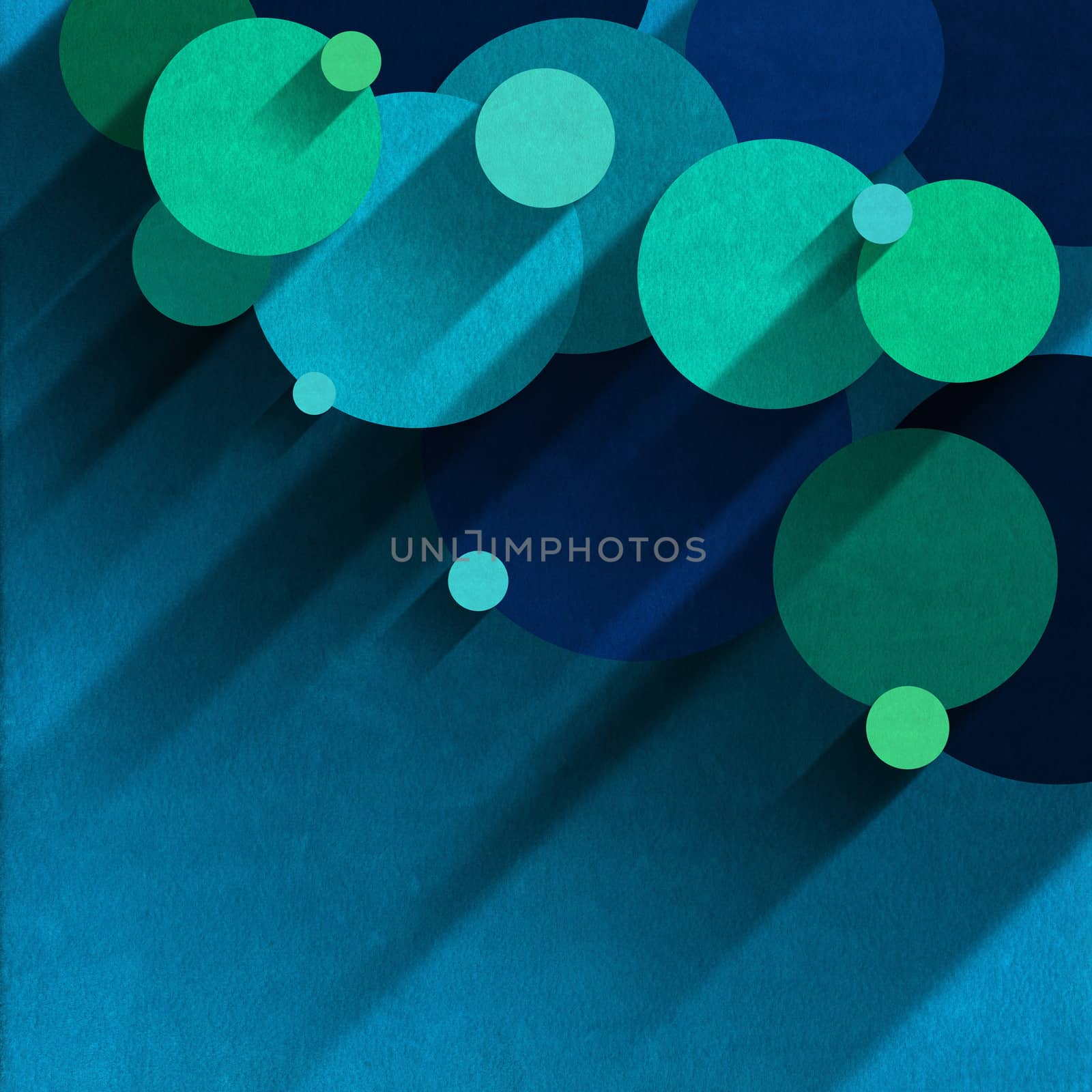 Circles of velvet, blue and green on light blue velvet background with shadows
