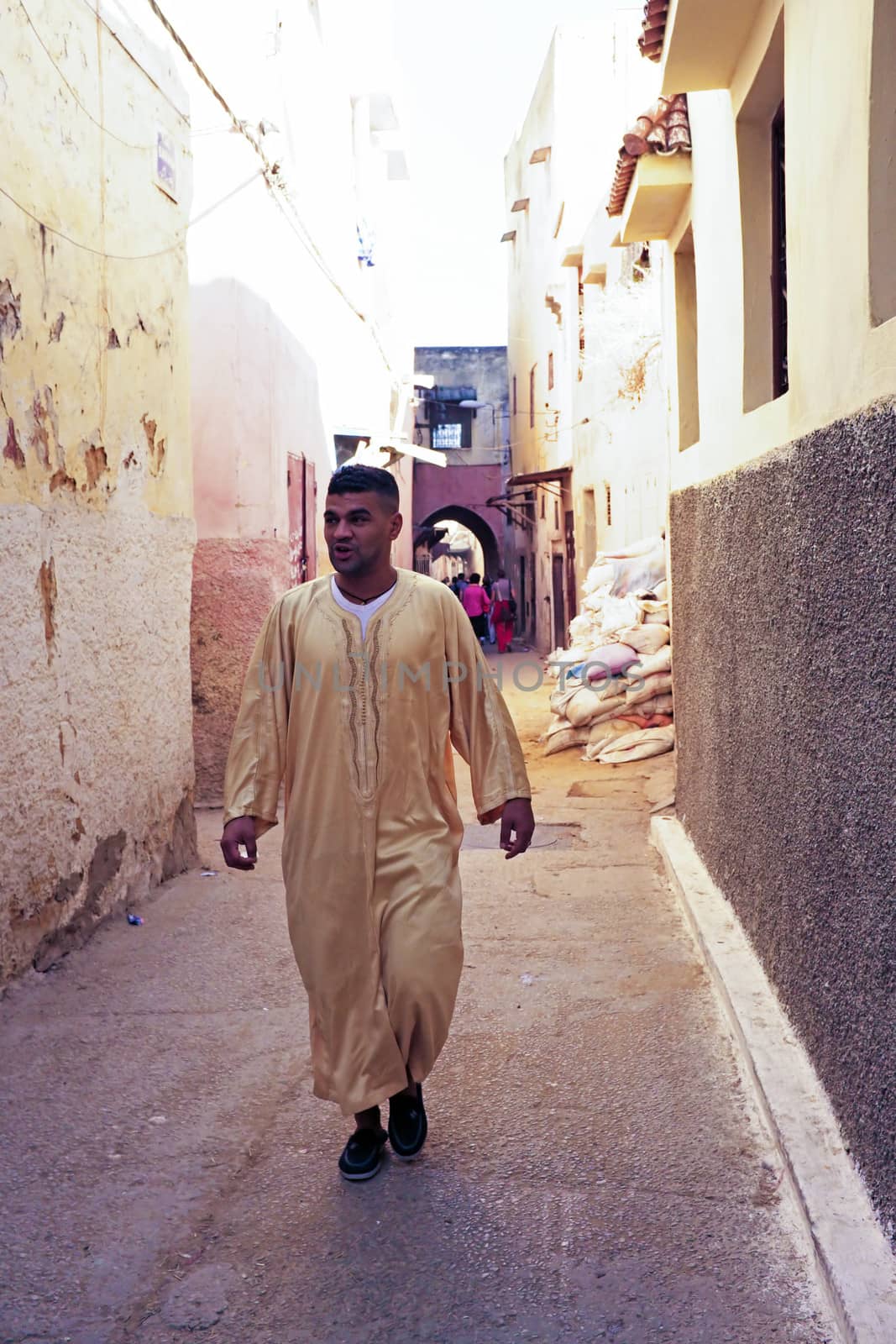 FES, MOROCCO - 15 OCTOBER 2013: Man is dressed up for Eid Al-Adha. The festival is celebrated by offering a sheep and distributing the meat to relatives, friends and the poor