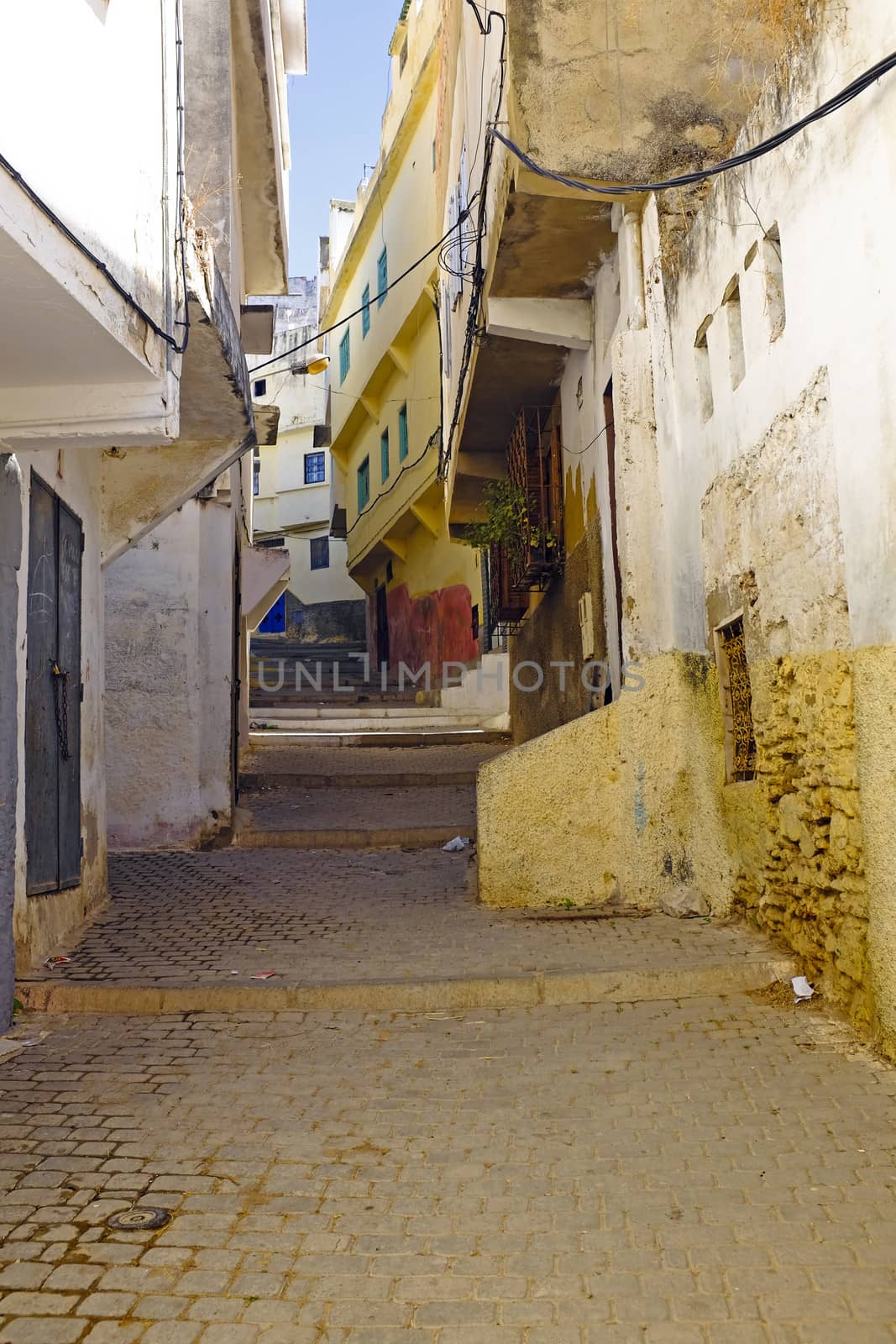 Old street in Moulay Idriss in  Morocco. It is holy town for the Moroccan people. It was here that Moulay Idriss I arrived in 789, bringing with him the religion of Islam and starting new dynasty.