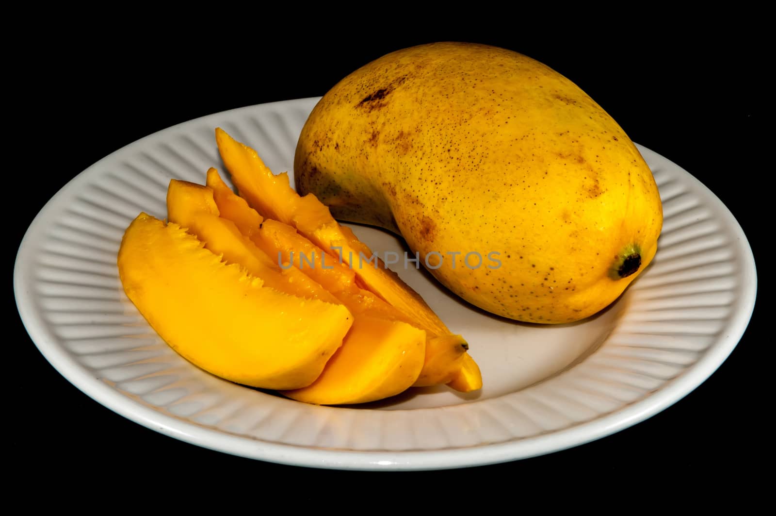 champagne ataulfo mango closeup isolated