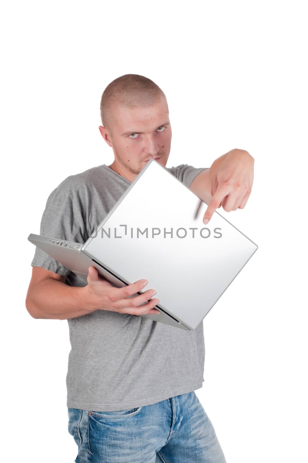 Man in casual clothes pointing the finger at laptop