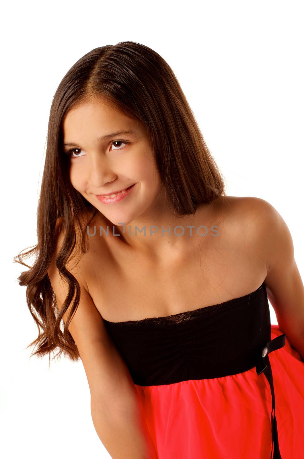 Cheerful Attractive Teen Girl with Long Beautiful Hair in Black and Pink Dress  isolated on white background