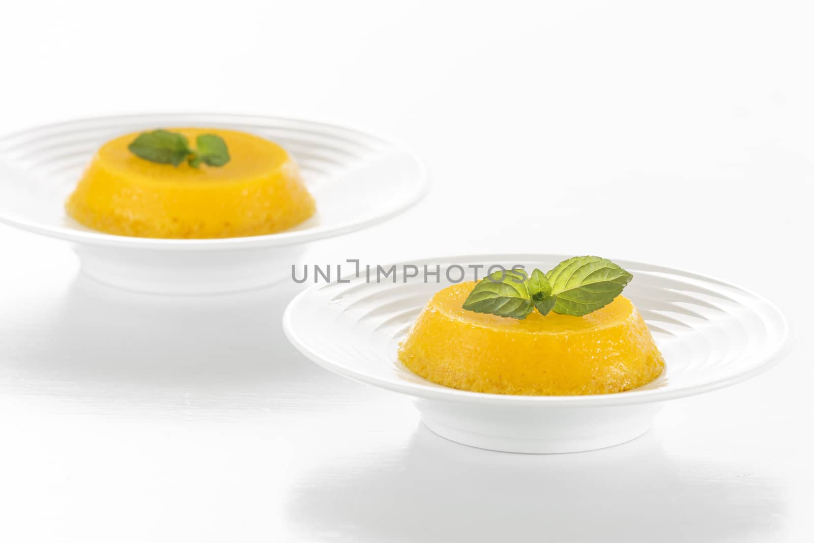 Quindim is a Brazilian Coconut Flan dessert made with egg yolks and coconut. 
