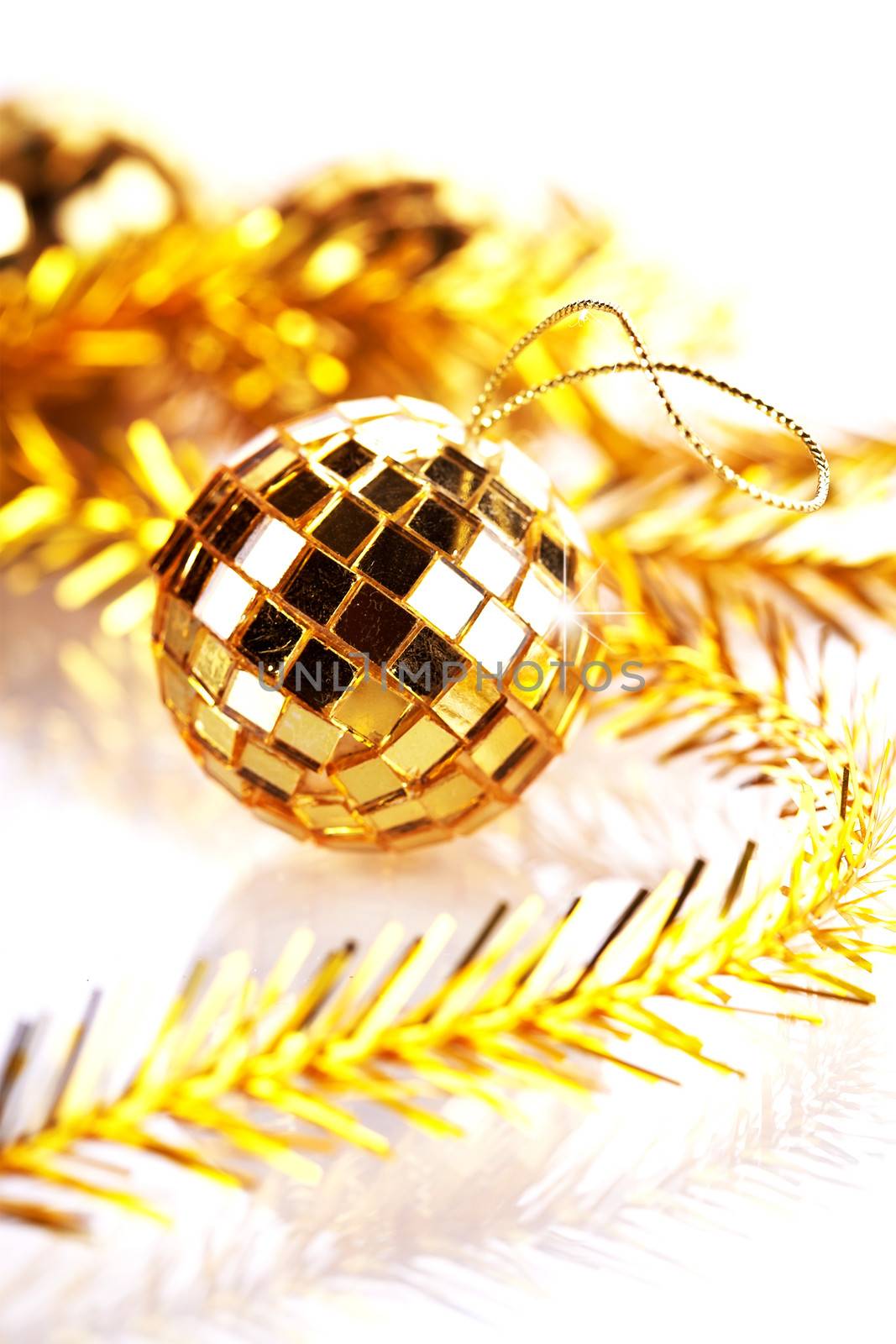 Gold mirror sphere and Christmas tinsel. by Azaliya