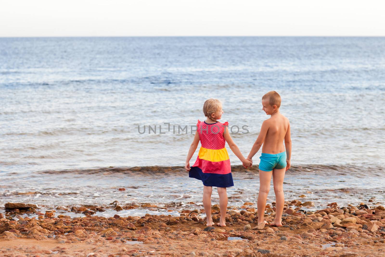 two children on the beach by vsurkov