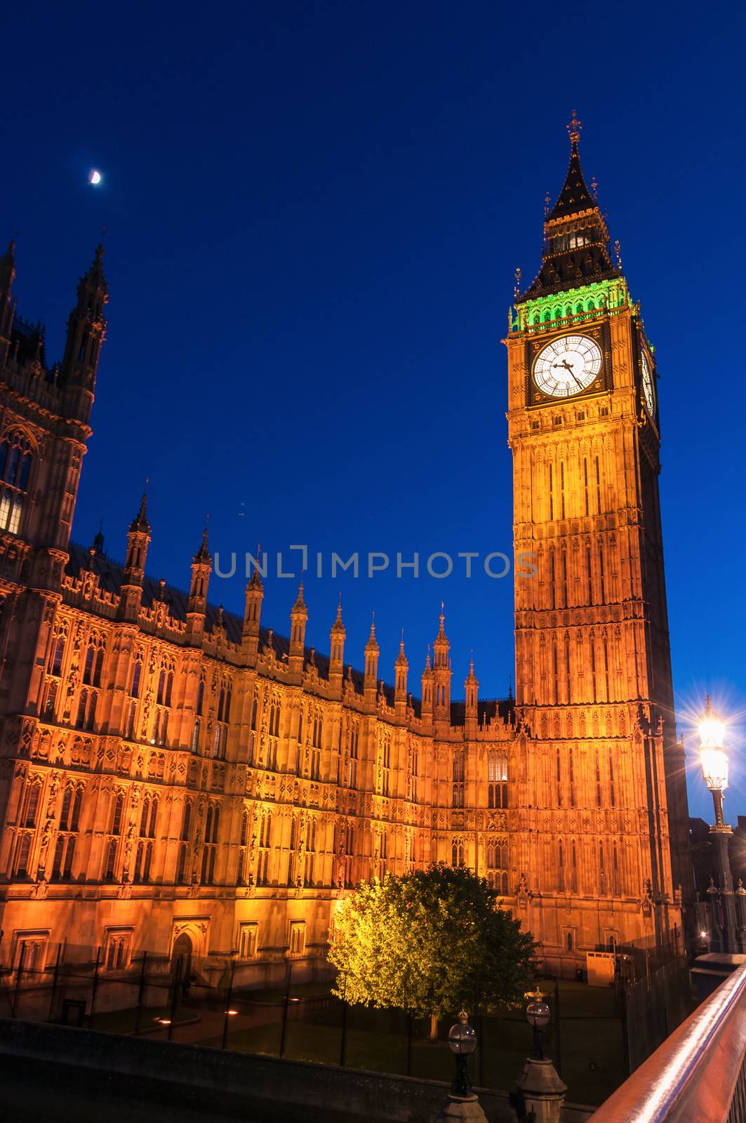 Big Ben, famous clock tower of Houses of Parliament in London at night, Great Britain