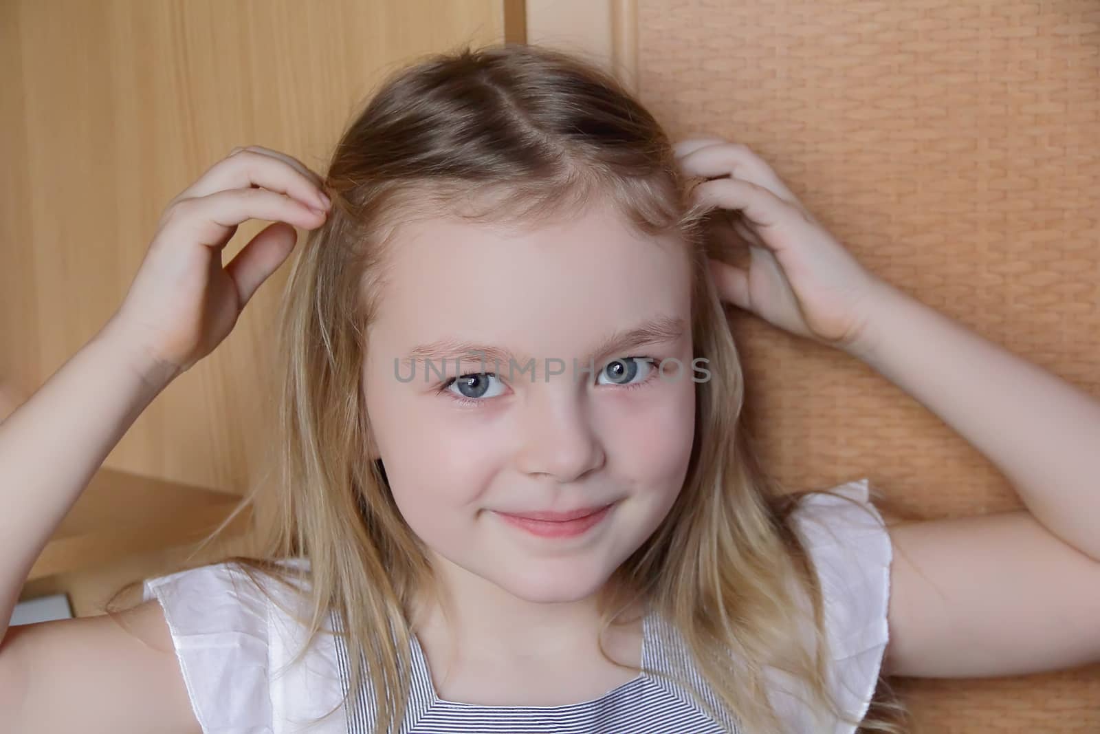 Portrait of beautiful girl with blue eyes