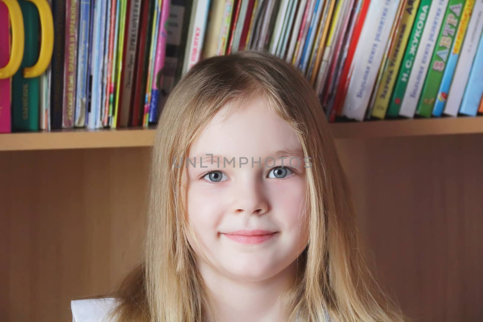 Portrait of beautiful girl with blue eyes