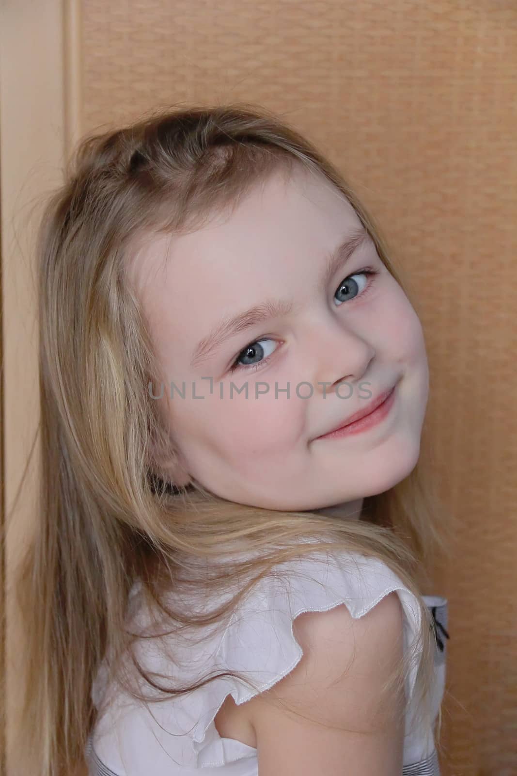 Portrait of beautiful girl with blue eyes