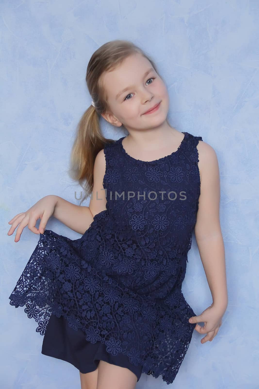 Portrait of beautiful girl with blue eyes