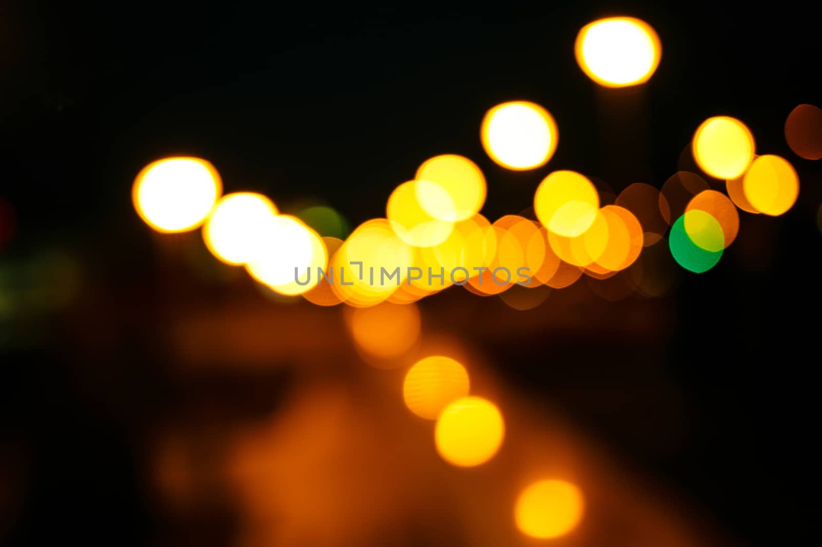 Abstract defocused lights of the night city bokeh background