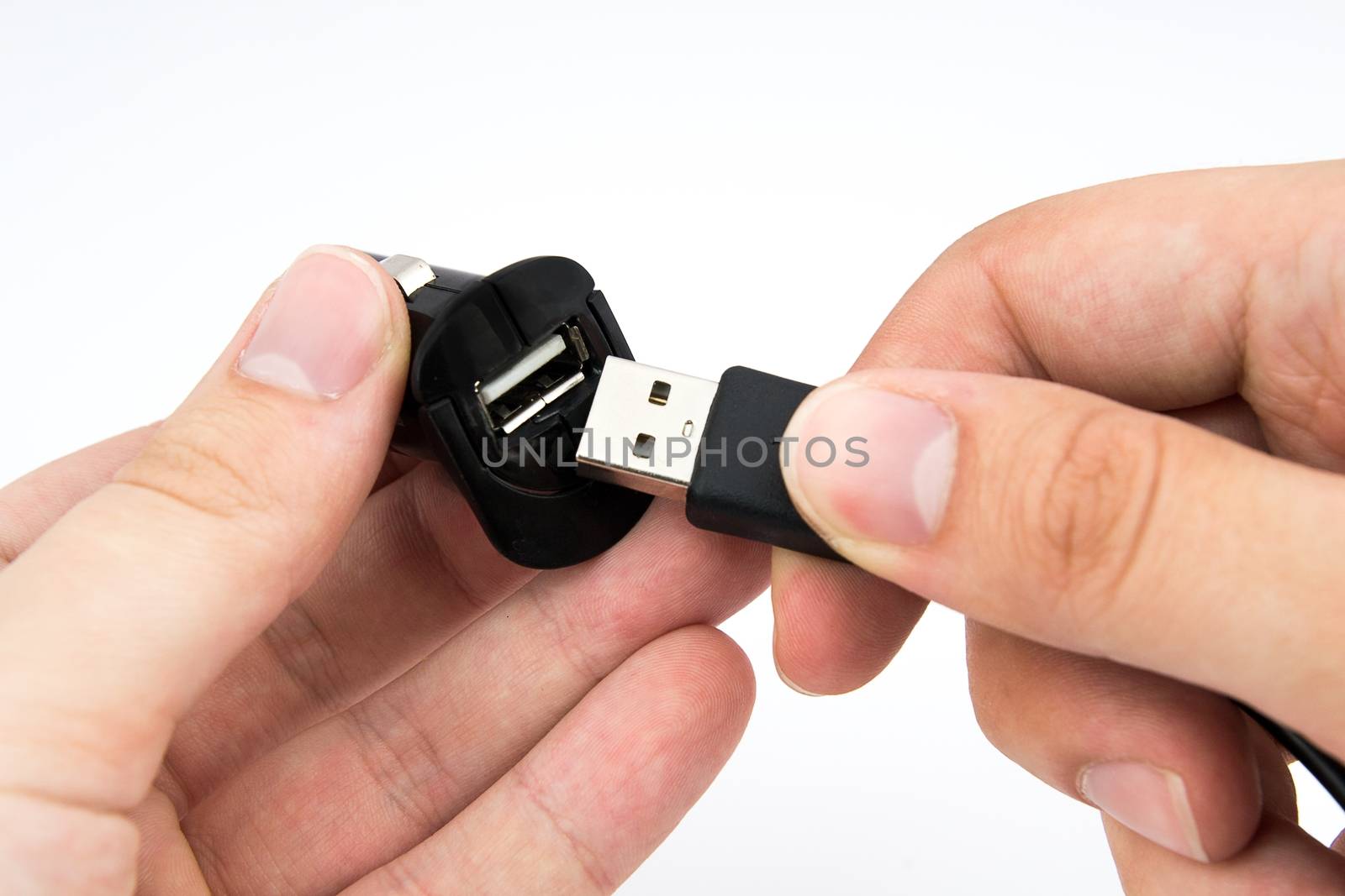 Man using USB car charger