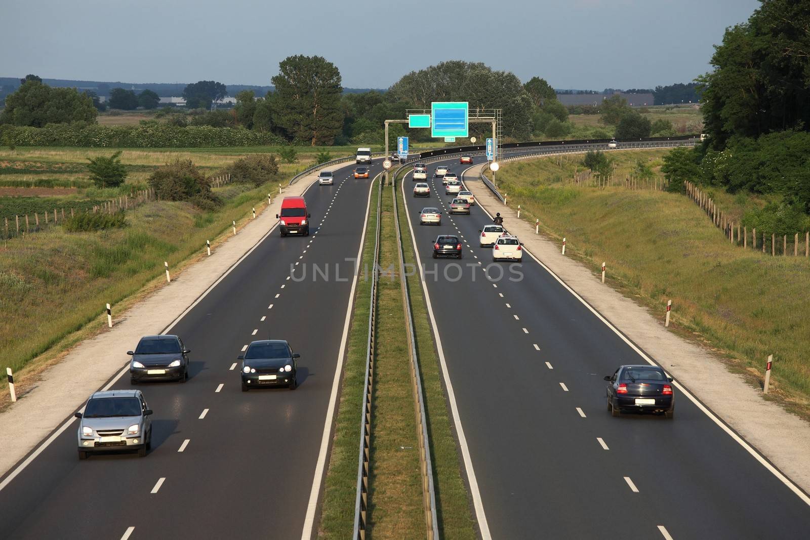 Highway with cars passing by