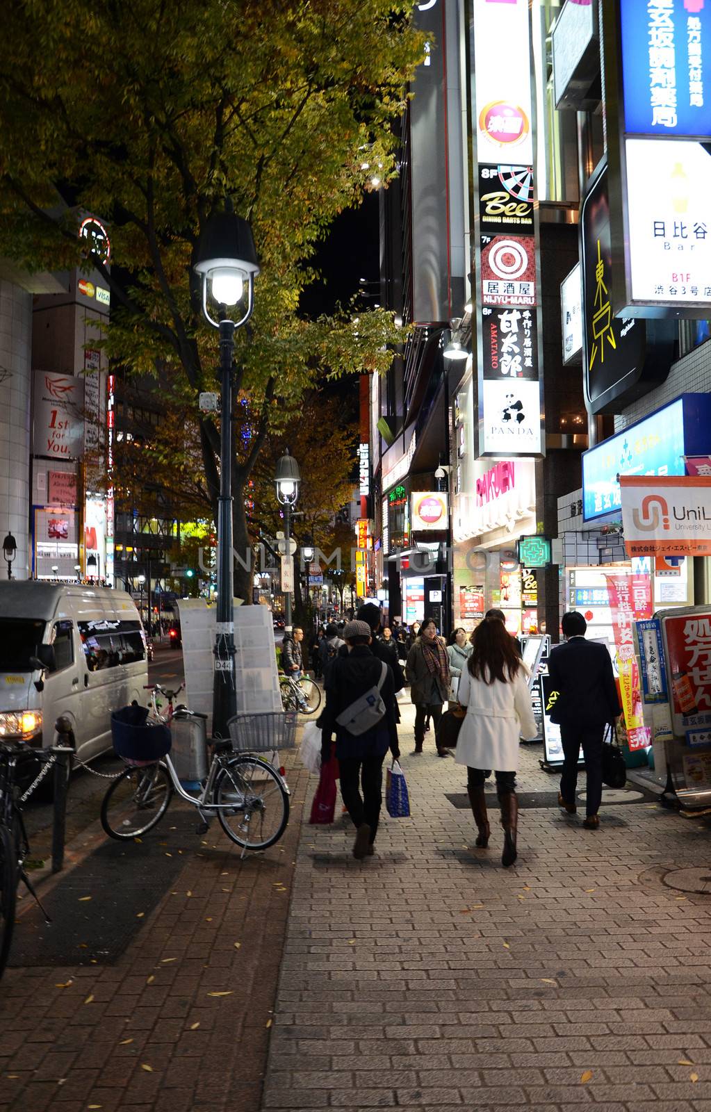 TOKYO, JAPAN - NOVEMBER 28: Shibuya is known as a youth fashion center in Japan as well as being a major nightlife destination November 28, 2013 in Tokyo, Japan. 