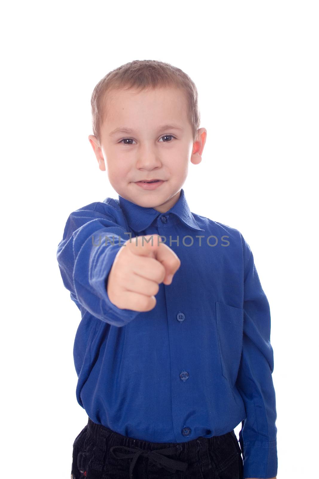 Boy pointing the finger isolated on white background