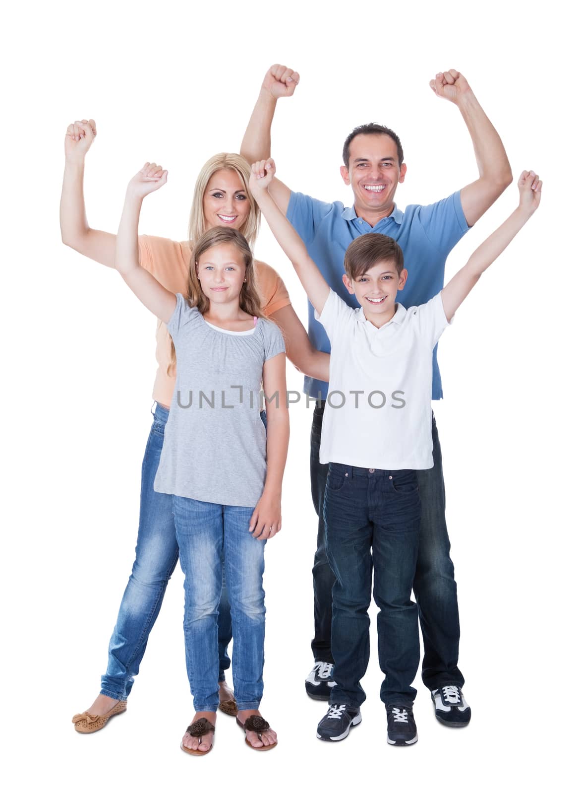 Portrait Of Happy Family With Two Children Isolated On White Background