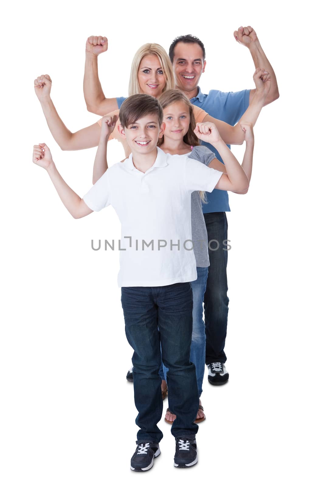 Portrait Of Happy Family With Two Children Isolated On White Background