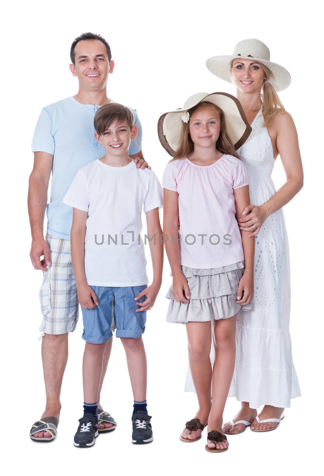 A Happy Family With Two Children Going For Vacation Isolated On White Background