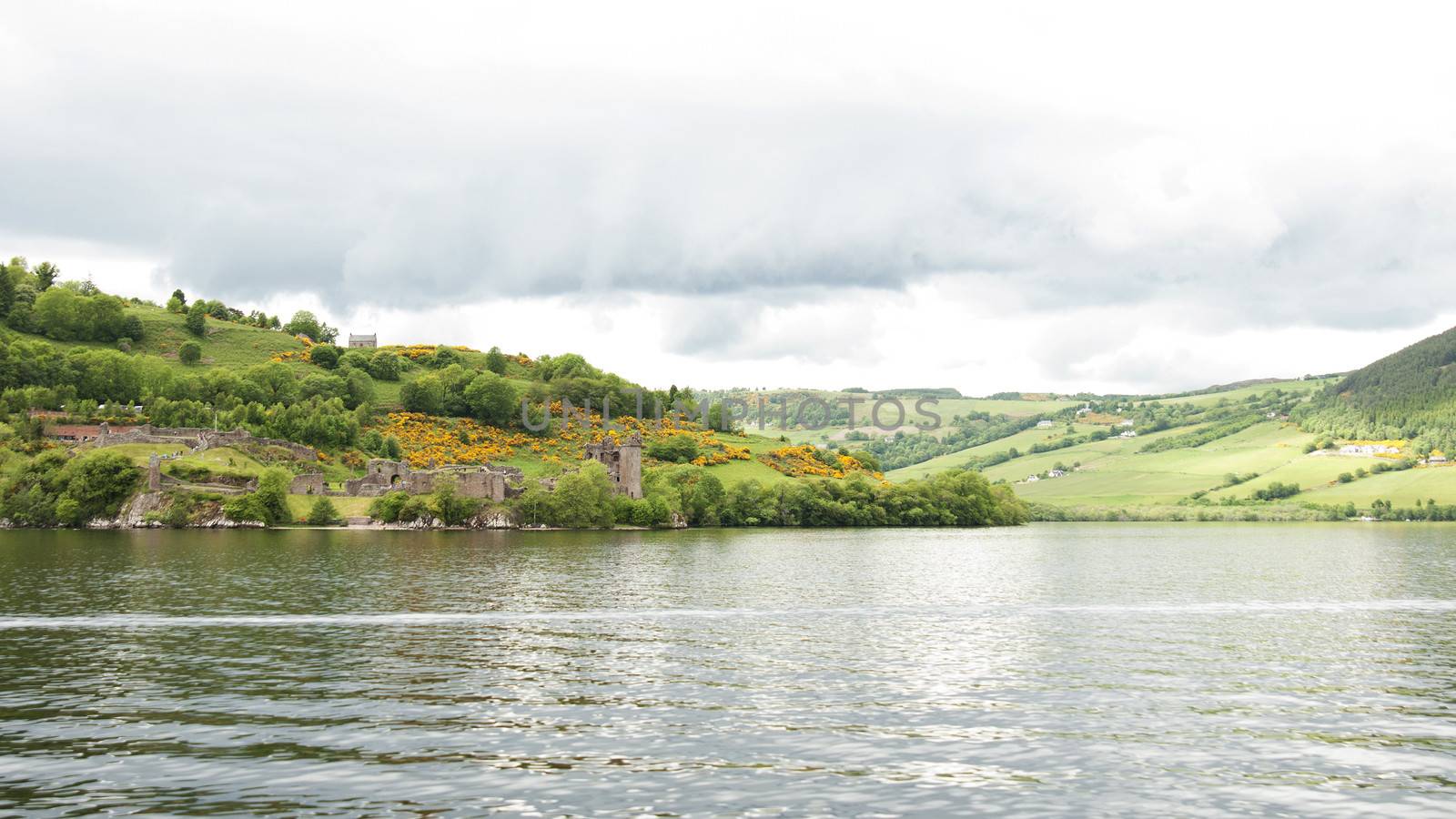 Urquhart Castle sits beside Loch Ness in the Highlands of Scotland.The present ruins date from the 13th to the 16th centuries, though built on the site of an early medieval fortification. Founded in the 13th century, Urquhart played a role in the Wars of Scottish Independence in the 14th century.