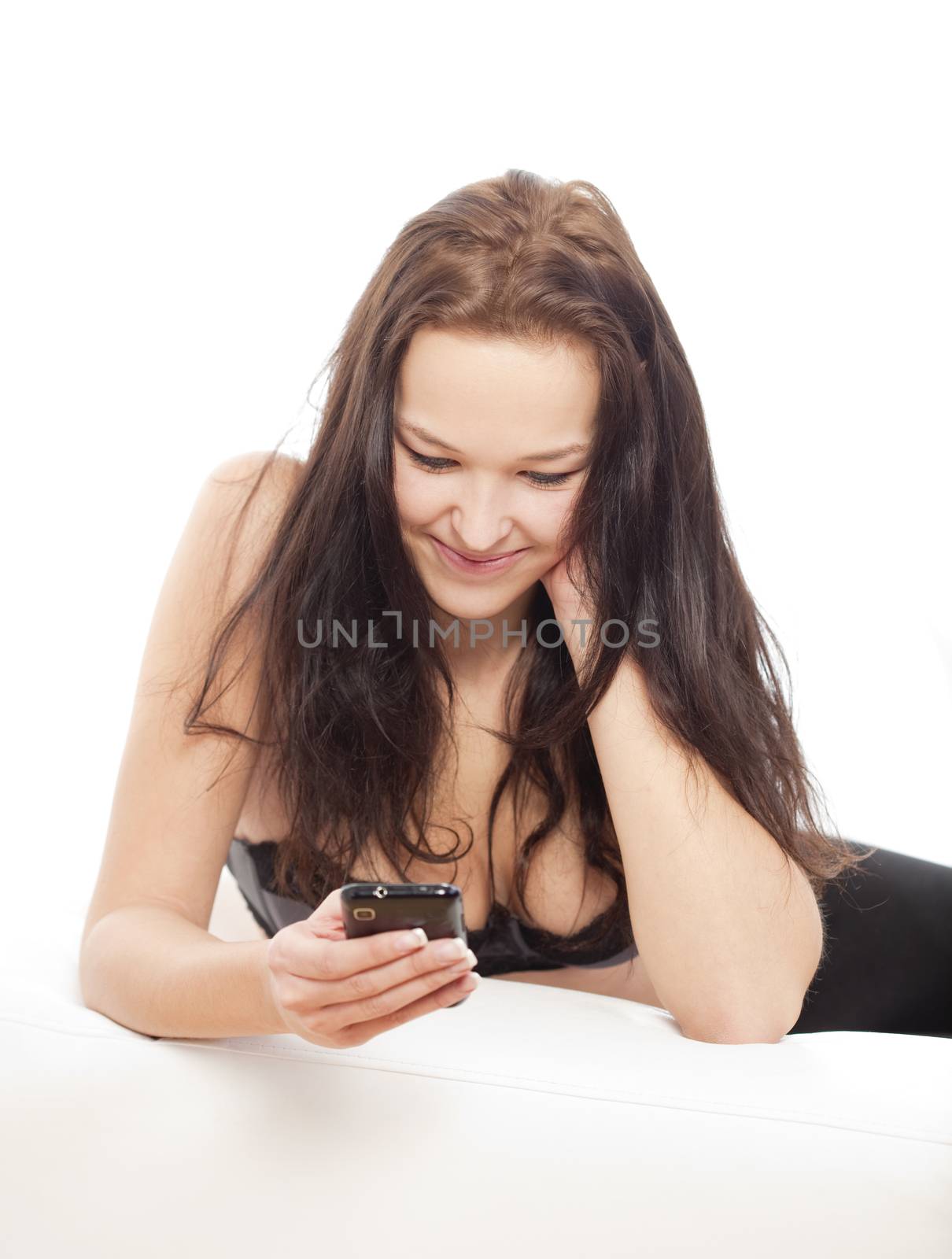 girl holding mobile phone by courtyardpix