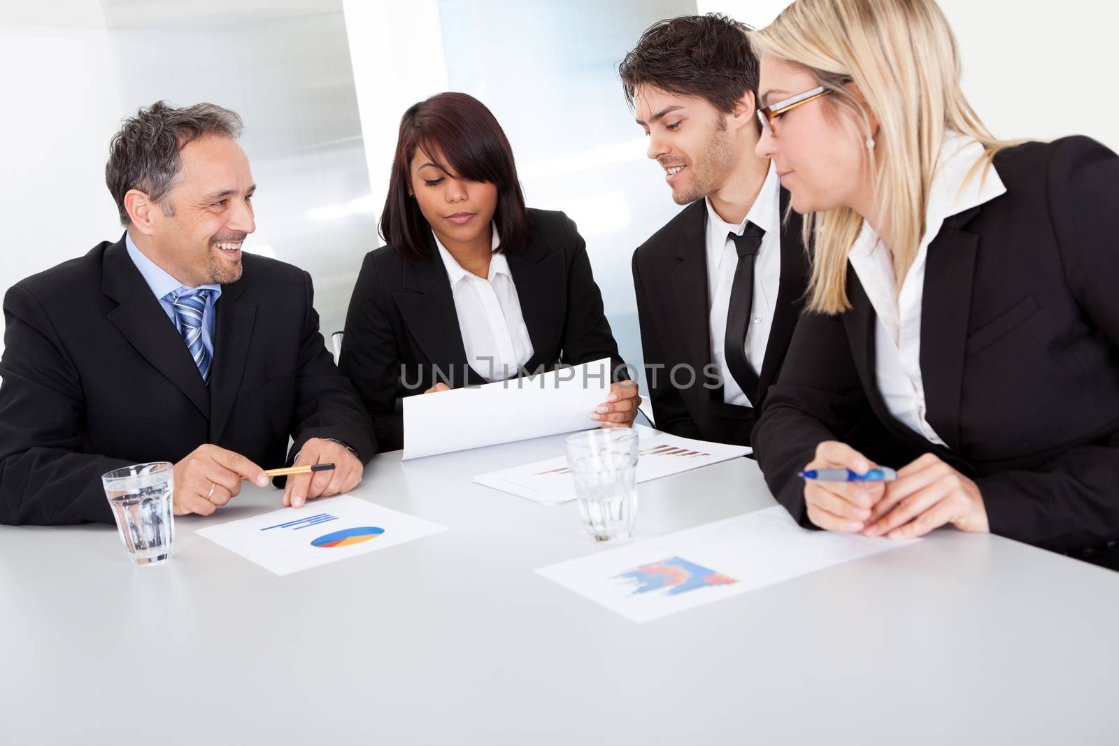 Group of business people at the meeting discussing