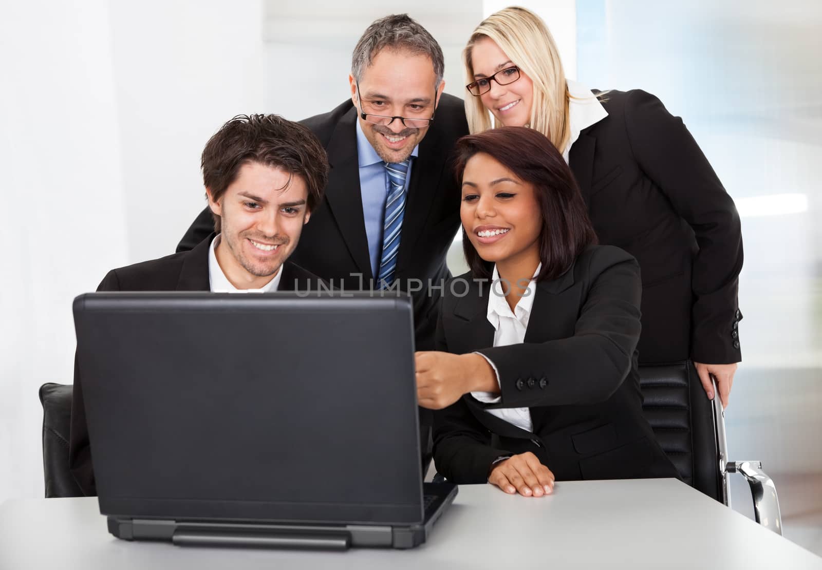 Group of business people at the meeting discussing