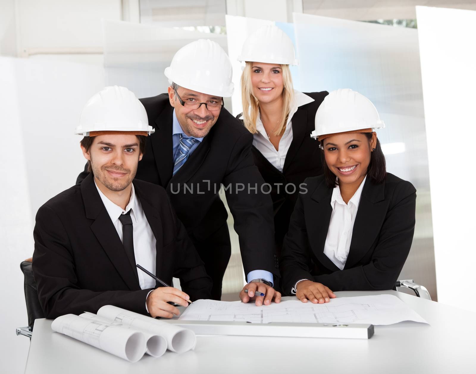 Group of architects at the meeting discussing the project