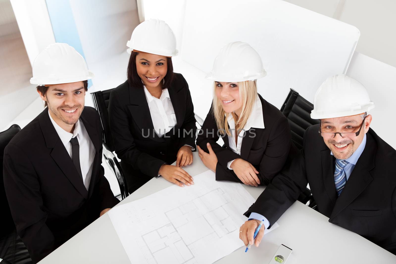 Group of architects at the meeting discussing the project