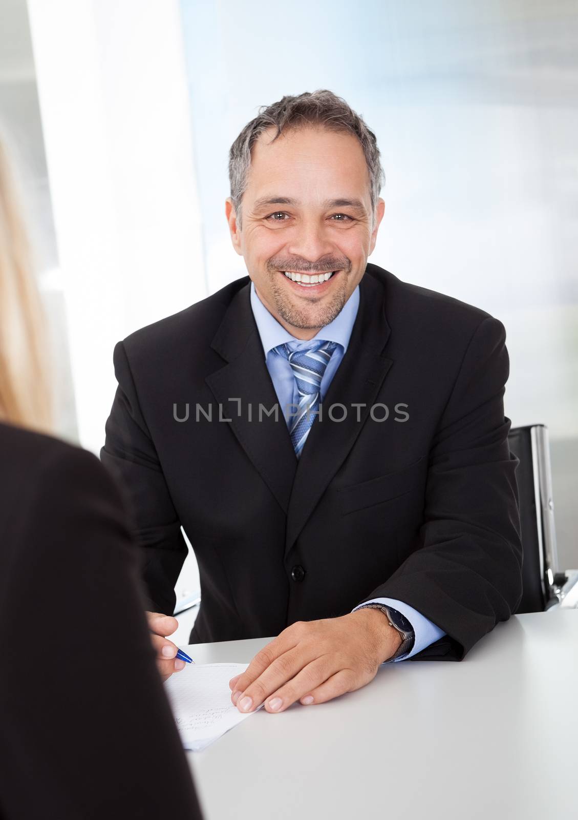 Portrait of successful businessman at the interview