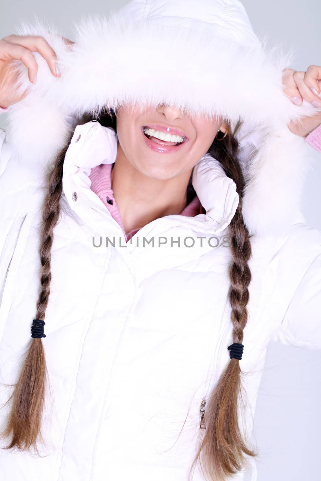 portrait of a beautiful happy woman in a knitted jacket