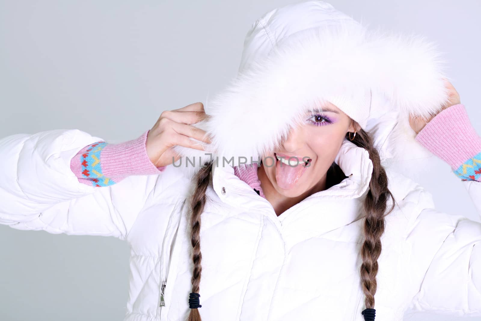 portrait of a beautiful happy woman in a knitted jacket