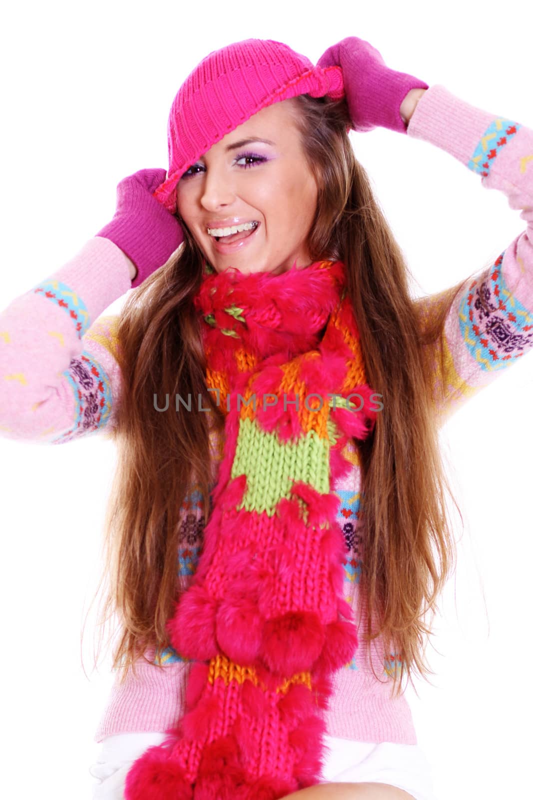 portrait of a beautiful happy woman in a knitted jacket