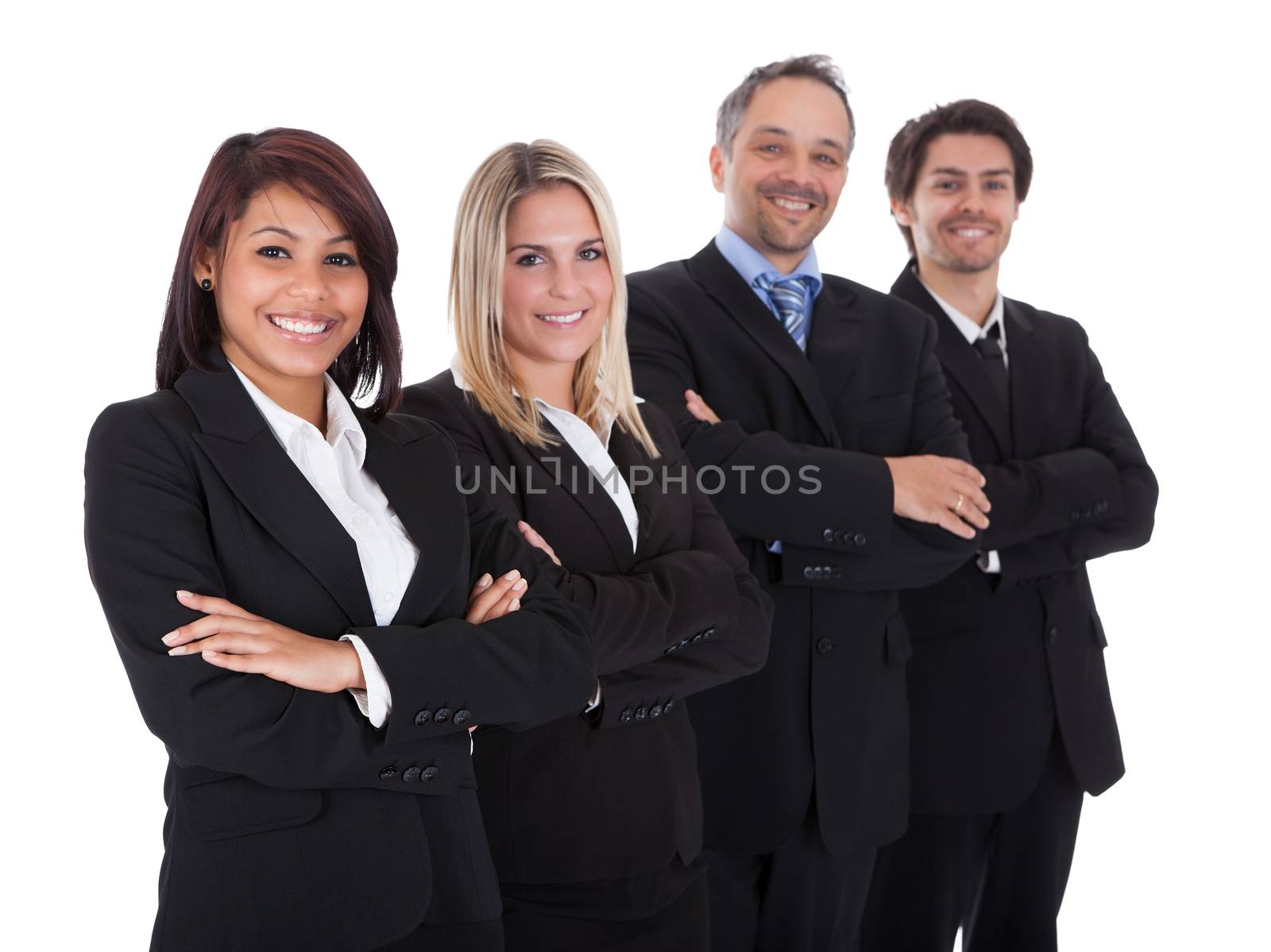 Diverse group of business people confidently standing  together on white background