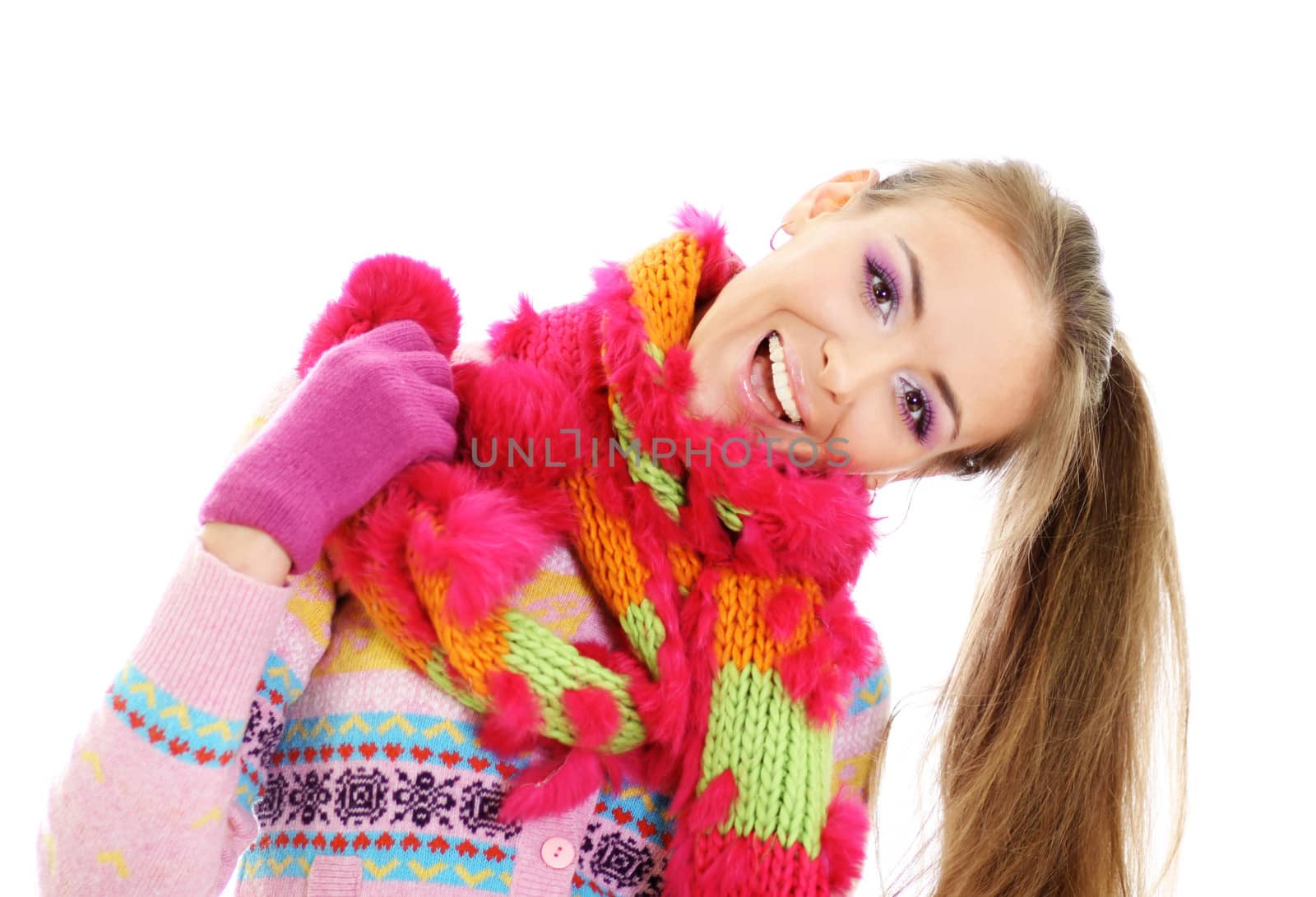 portrait of a beautiful happy woman in a knitted jacket by andersonrise