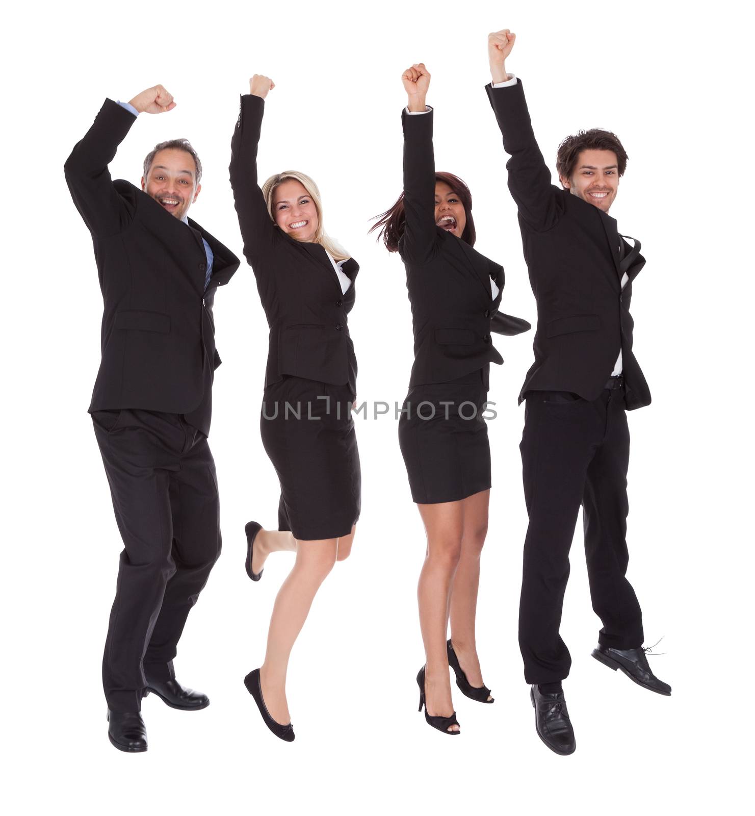 Portrait of multi ethnic team of business people rejoicing success on white background