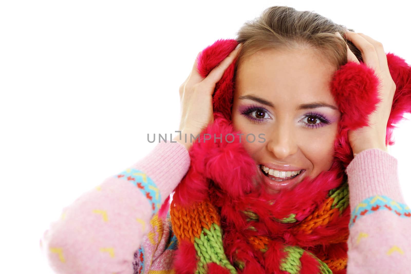 portrait of a beautiful happy woman in a knitted jacket by andersonrise