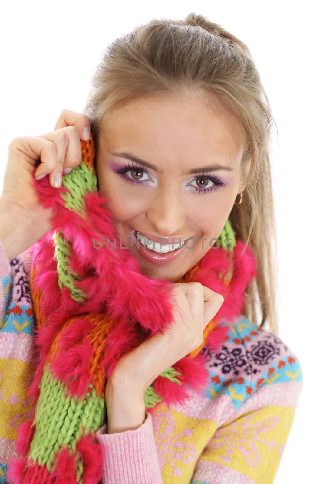 portrait of a beautiful happy woman in a knitted jacket