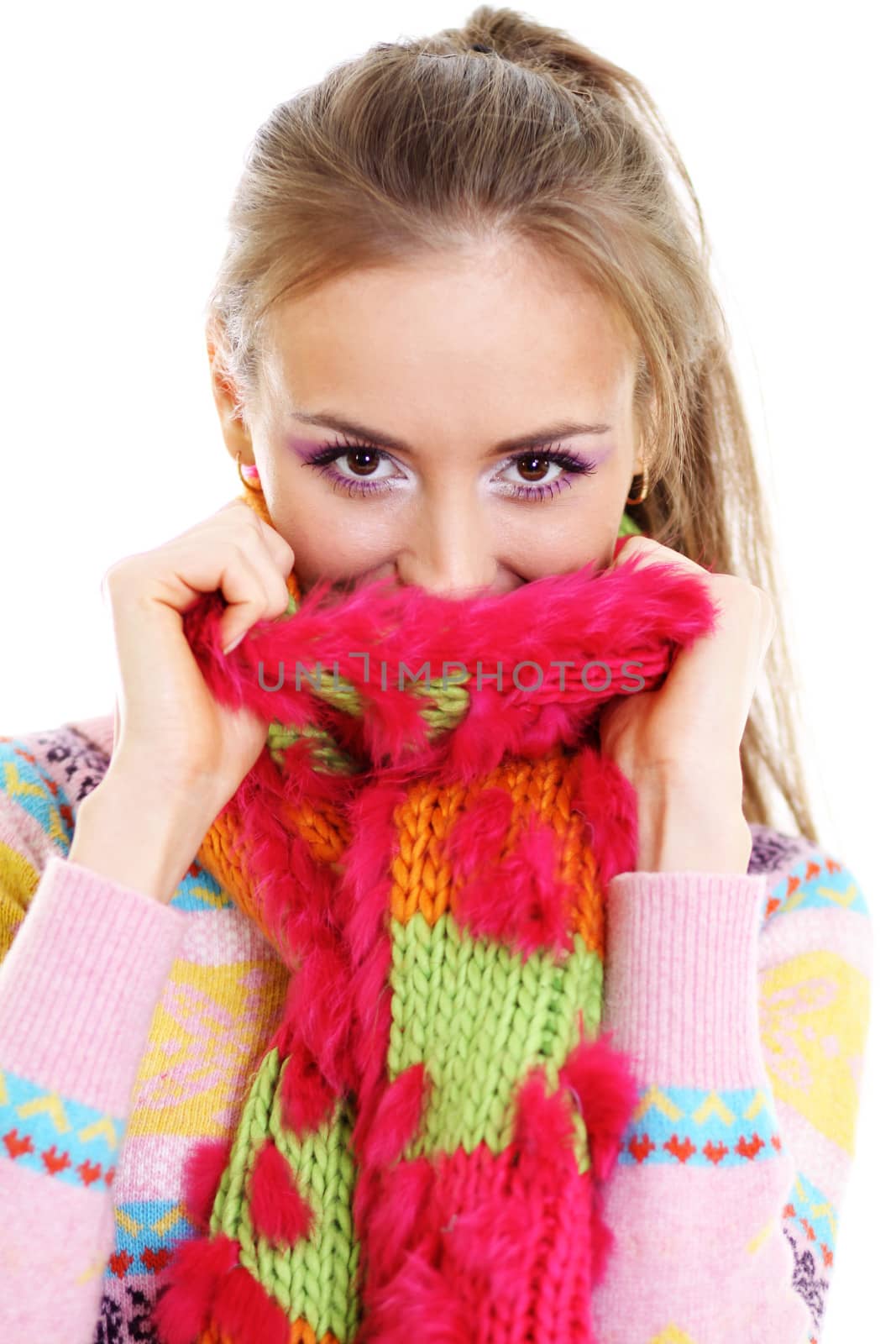 portrait of a beautiful happy woman in a knitted jacket