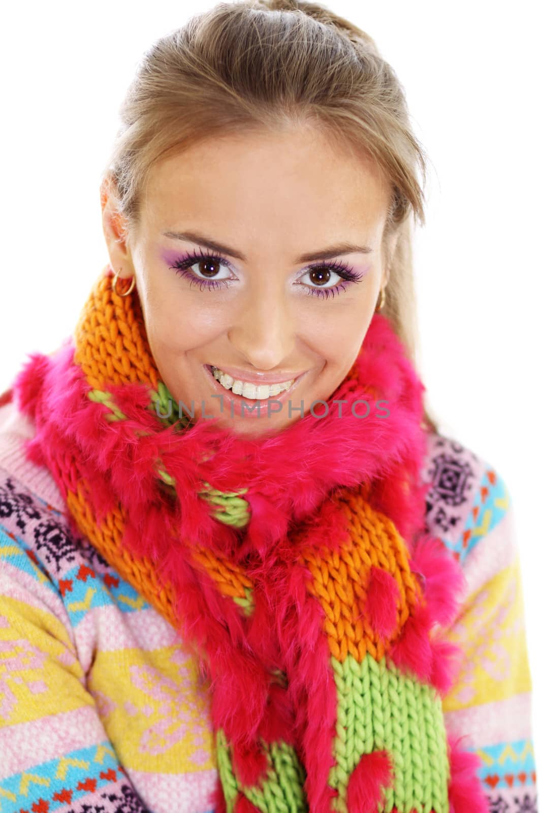 portrait of a beautiful happy woman in a knitted jacket