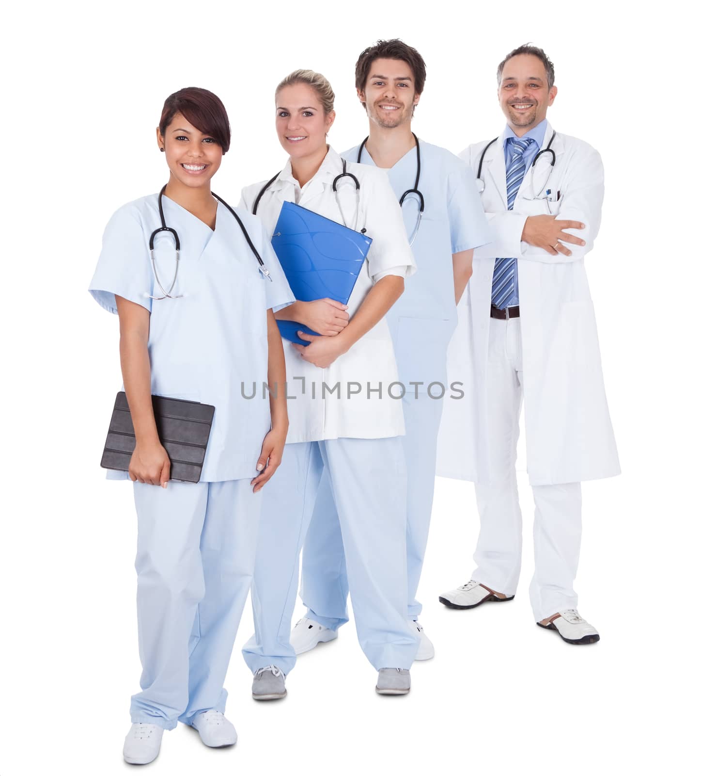 Group of doctors standing together isolated over white background