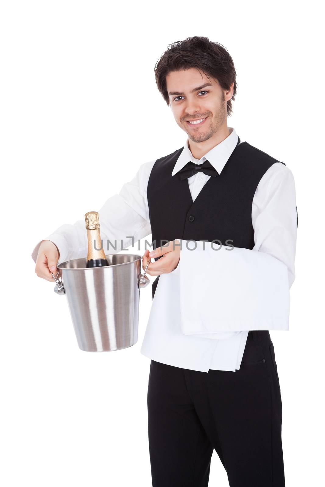 Portrait of a butler with bottle of champagne in a bucket. Isolated on white
