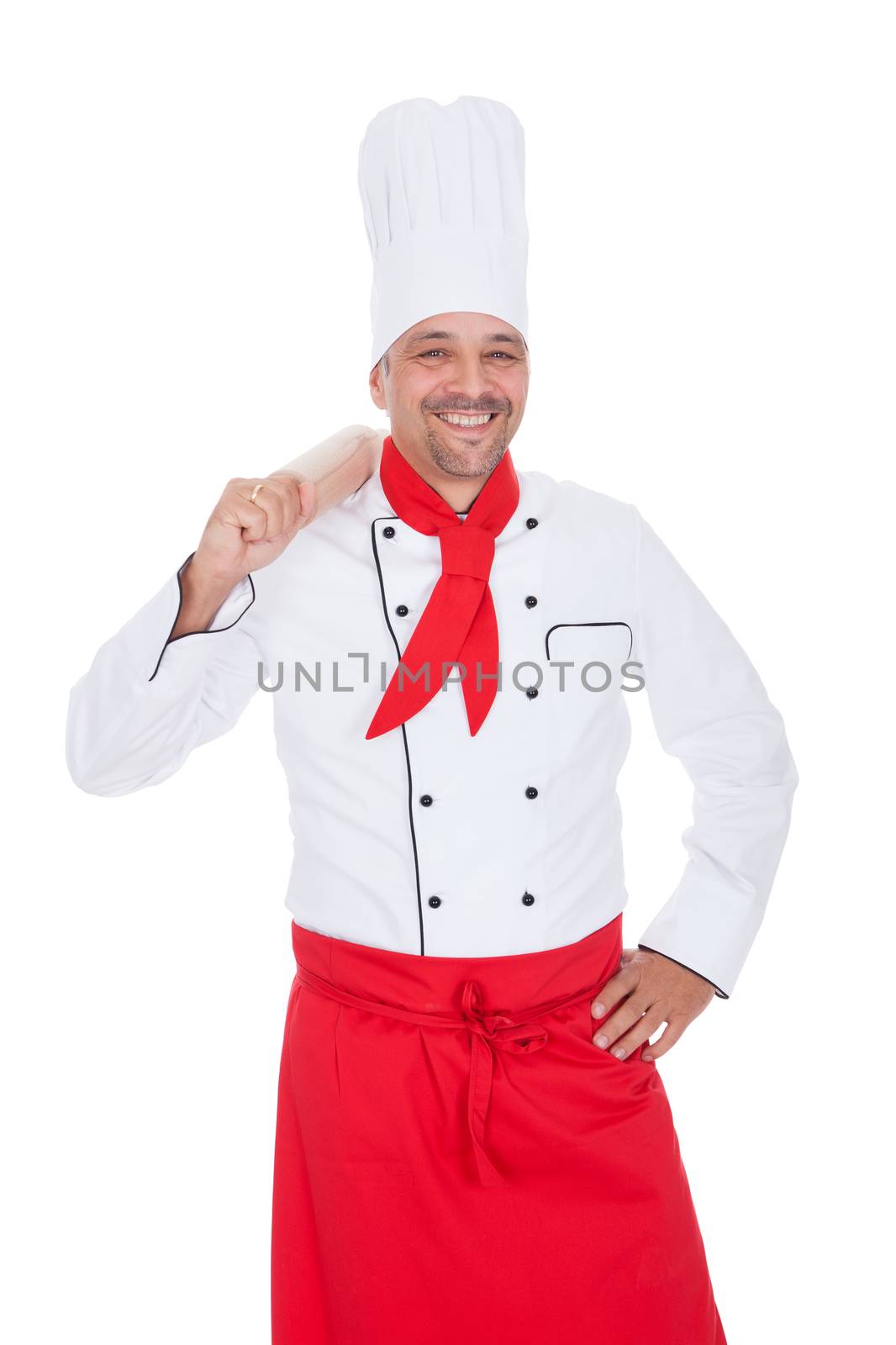 Portrait of a handsome cook. Isolated on white