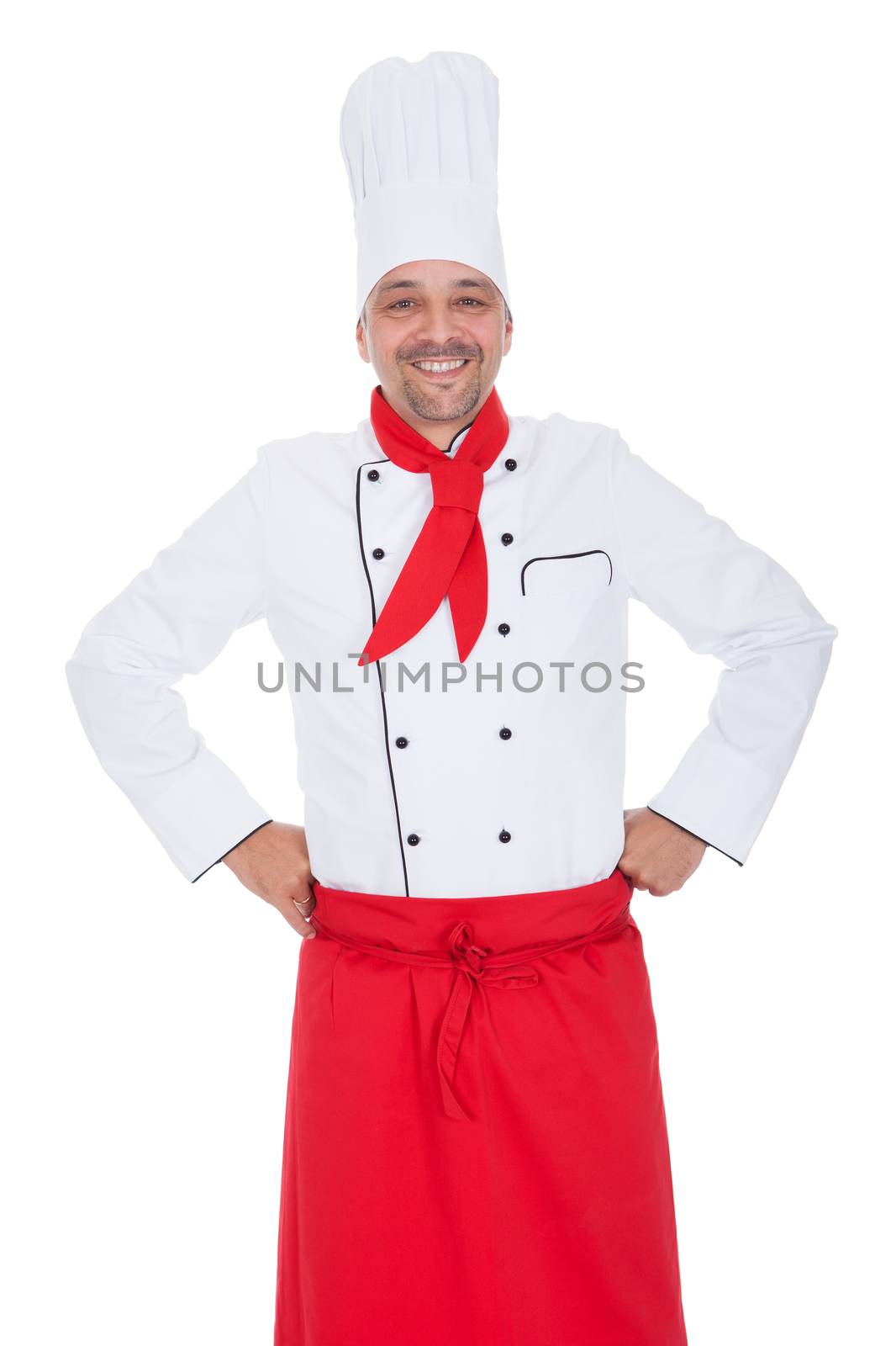 Portrait of a handsome cook. Isolated on white