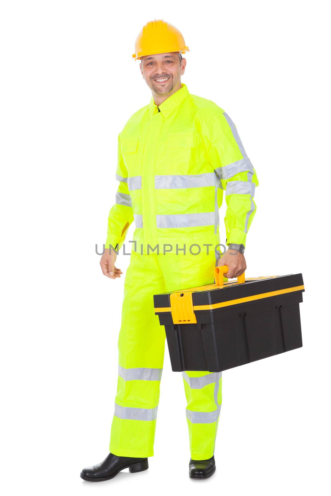 Portrait of worker wearing safety jacket and helmet. Isolated on white