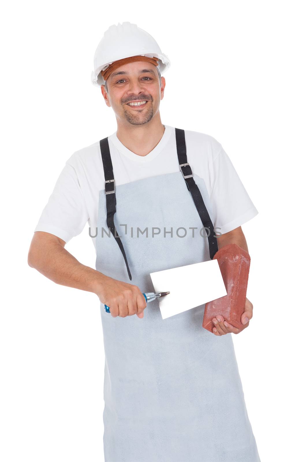 Portrait of smiling bricklayer. Isolated on white